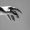 A hand with a gray background